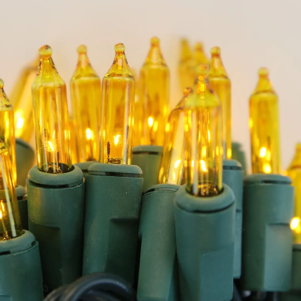 50-bulb Yellow Mini Lights, 4" Spacing, Green Wire