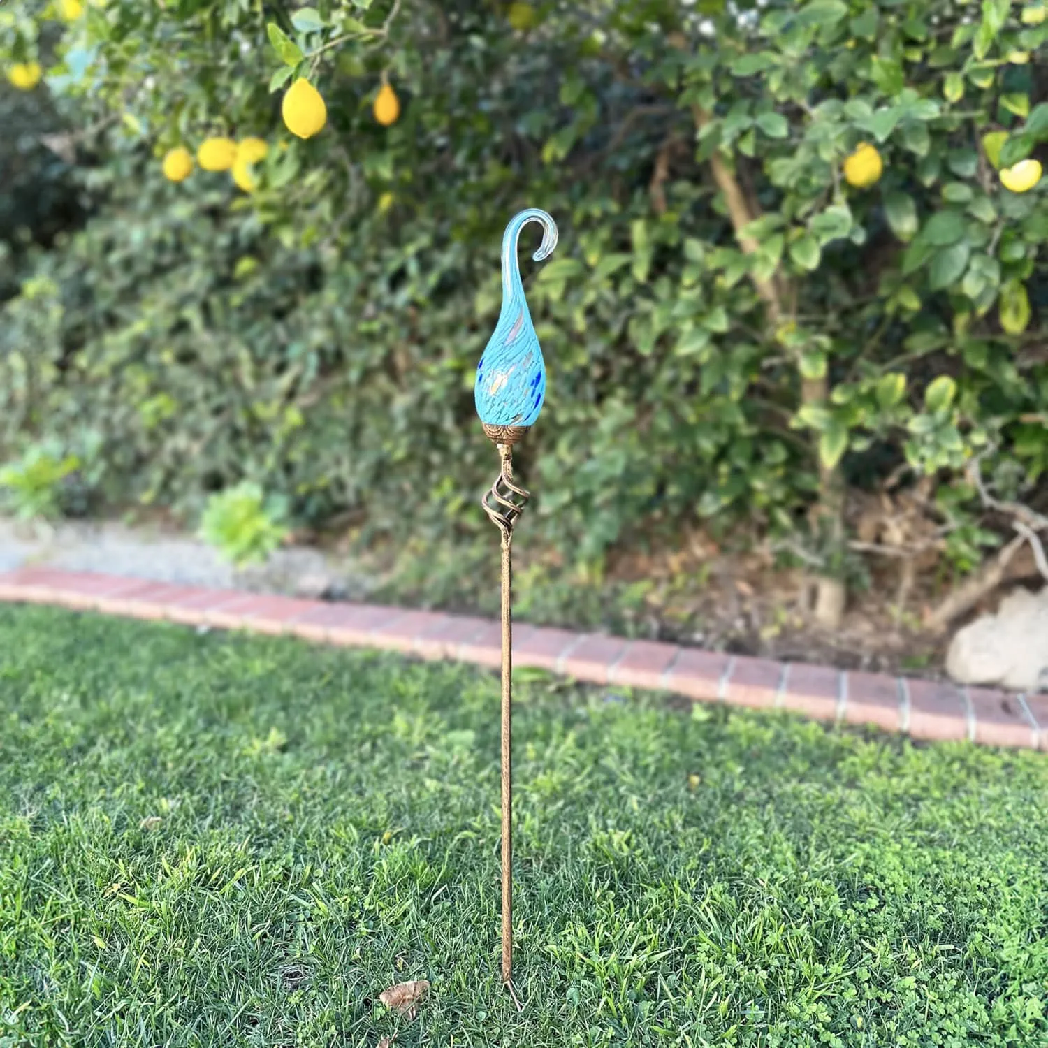 Solar Pearlized Glass Spiral Flame Garden Stake with Metal Finial Detail in Light Blue, 36 Inch